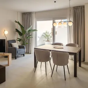 https://panasco-suites.puertodelcarmen-hotels.org